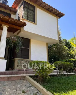 a house with a sign in front of it at finca de recreo in Sopetran