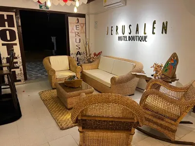 a room with wicker chairs and chairs in a store at Jerusalén Hotel Boutique in Mariquita