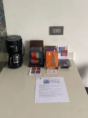 a counter top with a coffee maker and a coffee pot at Apto - Vista Única en Manizales in Manizales