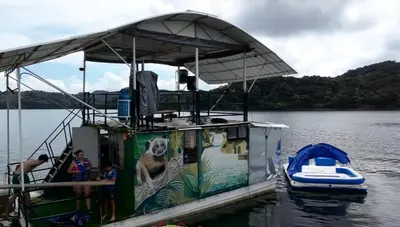 a boat with a dog painted on the side of it at El Ismael de Jaguas in San Rafael