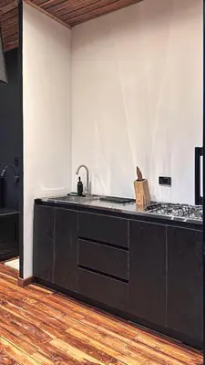 a kitchen with a sink and a stove at Cabaña 35min de Medellín, Benevento Reserva Botánica in Girardota