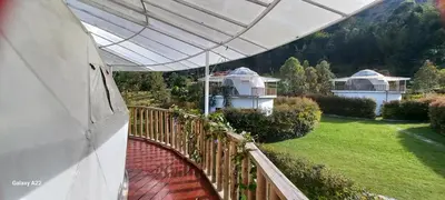 a view of a house from a balcony at Cinco Elementos in El Peñol