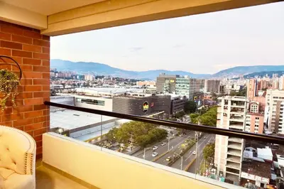 a balcony with a view of a city at Deluxe apartment with an incredible view in envigado in Envigado