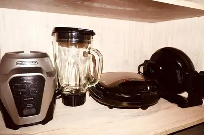 a blender and a toaster sitting on a shelf at Deluxe apartment with an incredible view in envigado in Envigado