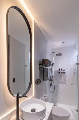 a bathroom with a sink and a mirror at Luxury penthouse with Jacuzzi and AC, North Medellin in Medellín