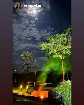 a view of a park at night with the moon at Altos del silencio in San Rafael