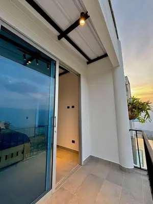 a balcony with a view of the ocean at Villa Entre Nubes in El Hatillo