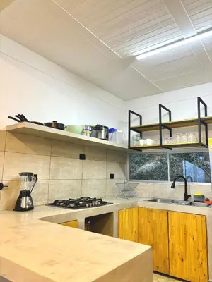a kitchen with a sink and a counter top at Villa Entre Nubes in El Hatillo