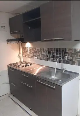 a kitchen with a sink and a stove at Apartamento Vacacional in San Carlos Antioquia in San Carlos