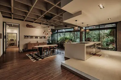 a large kitchen with a table and a dining room at Designer Loft, Unique location, Provenza, Lleras in Medellín
