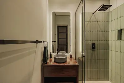 a bathroom with a sink and a shower at Designer Loft, Unique location, Provenza, Lleras in Medellín