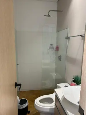 a bathroom with a shower and a toilet and a sink at Great view 3 bedroom apartment near Provenza 1101 in Medellín