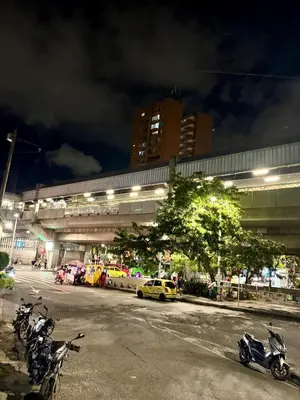 a group of motorcycles parked in front of a building at Lucia Metro House in Medellín