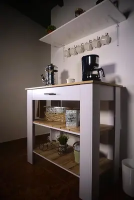 a white counter with pots and pans on it at Inolvidable experiencia en Jericó, lugar tranquilo in Jericó