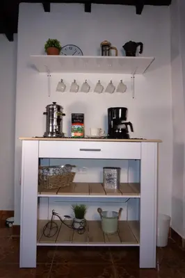 a white shelf with pots and pans on it at Inolvidable experiencia en Jericó, lugar tranquilo in Jericó