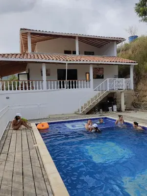 a group of people in a swimming pool at Finca de Rubén in Olaya