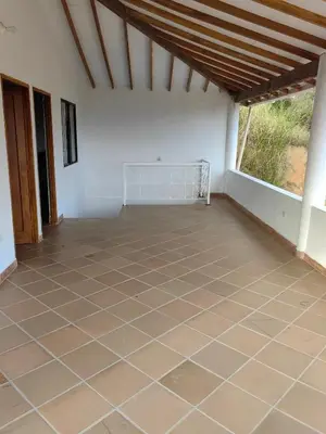 a room with a tiled floor in a house at Finca de Rubén in Olaya