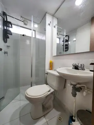 a bathroom with a toilet and a sink and a shower at Family Resort Santa Fe De Antioquia - Santa Fe de Antioquia in Santa Fe de Antioquia