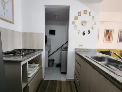 a kitchen with a sink and a counter top at Family Resort Santa Fe De Antioquia - Santa Fe de Antioquia in Santa Fe de Antioquia