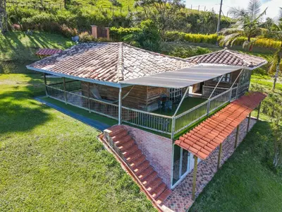 an overhead view of a house with a roof at Loge Cabaña peñol-Guatape in El Peñol