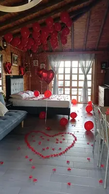 a room with a heart made out of red balloons at Loge Cabaña peñol-Guatape in El Peñol