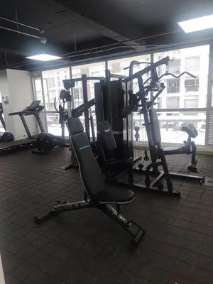 a gym with several tread machines in a room at Brand New Apartment Manizales in Manizales