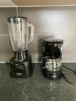 a blender on a counter next to a coffee maker at Suite de Lujo en Llano Grande - Piscina, jacuzzi, Turco, Gimnasio in Rionegro