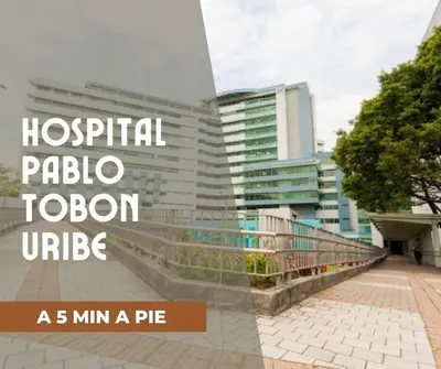 a large building with the words hospital plaza horizon update at Casa de las Flores en Medellín in Medellín