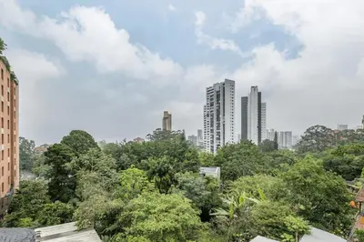 a city skyline with tall buildings and trees at Poblado, 5 min to San Lucas Plaza, Free parking 316 in Medellín