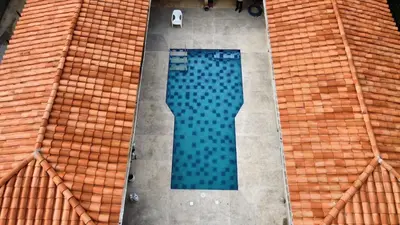 an overhead view of a swimming pool on a roof at Mariposa 1 in Sopetran