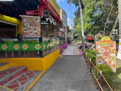 a store on the side of a street at 1BR AC Near Unicentro, UPB & Parques Laureles in Medellín
