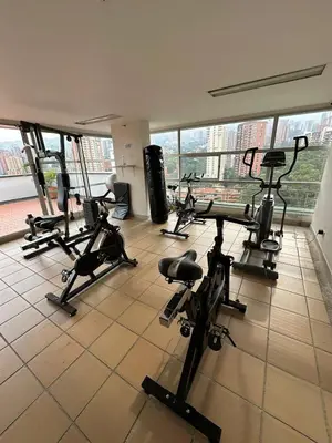 a gym with several exercise bikes in a room at Apartamento en el Poblado junto al cc Santa Fe in Medellín