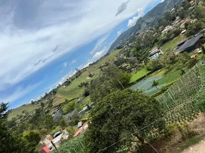 a view of a valley with houses on a hill at Villa Guarne Merlot in Guarne