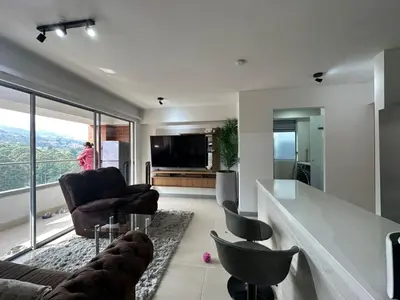 a living room with a couch and chairs and a television at apartamento familiar de 3 habitaciones por meses in La Estrella