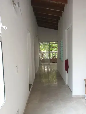 an empty hallway with white walls and a ceiling at Tu Lugar ideal in Envigado