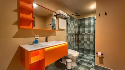 a bathroom with a sink and a shower at Autenthico Provenza Home Medellin in Medellín