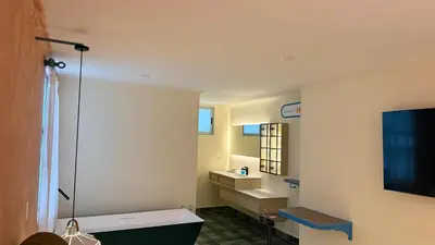 a bathroom with a sink and a mirror at Autenthico Provenza Home Medellin in Medellín