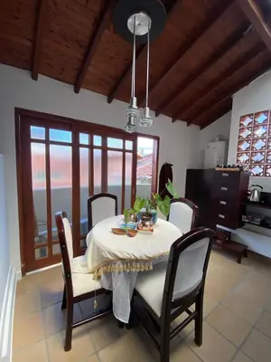 a dining room with a table and chairs at Casa Tobi in Rionegro