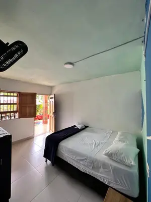 a bedroom with a bed in a room at consorcio club Paradise in San Rafael