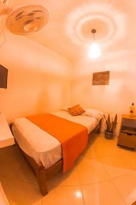 a bedroom with two beds and a ceiling at Índigo Cowork in San Rafael
