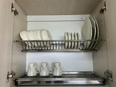 a kitchen with plates and utensils on a shelf at Apartamento TERMINAL DE TRANSPORTE, CABLE AEREO, DOLLARCITY, D1 in Manizales