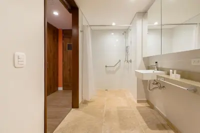 a bathroom with a sink and a mirror at Room Modern Elegance Just Steps from El Tesoro 306 in Medellín