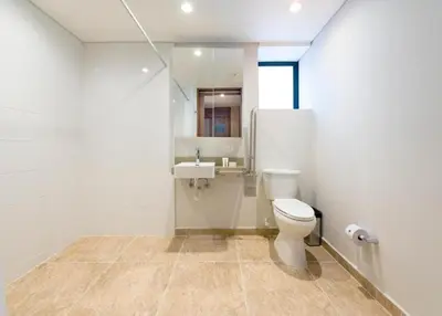 a bathroom with a toilet and a sink at Comfort and Style -Exclusive Area in El Tesoro 307 in Medellín