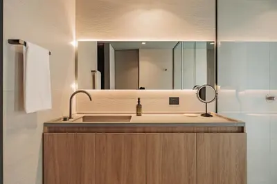 a bathroom with a sink and a mirror at The Somos Loho Hotel in Medellín