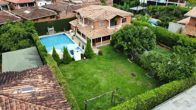 an aerial view of a house with a swimming pool at Espectacular finca , San Jerónimo in San Jerónimo