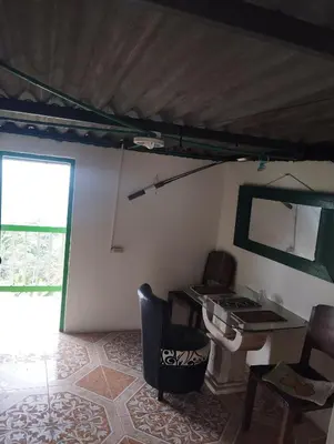 a room with a desk and a chair and a window at Casa finca en pueblo rico Neira in Neira