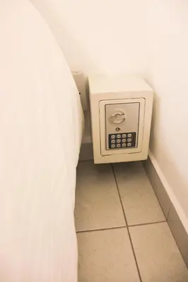 a microwave oven sitting on the corner of a room at Urban Oasis Med in Medellín