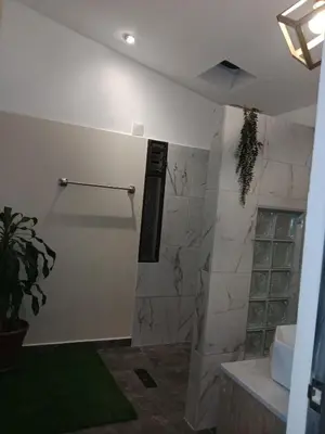 a bathroom with a shower and a sink at Envigado tradicion y modernidad in Envigado