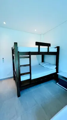 a bedroom with two bunk beds in a room at Luxury Estate with Private Pool & Jacuzzi in Sopetran