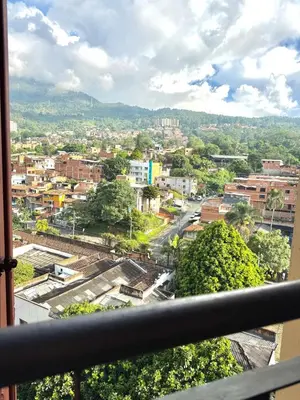 a view of a city from a balcony at Alojamiento Central en Medellín en Zona Turística BA in Medellín